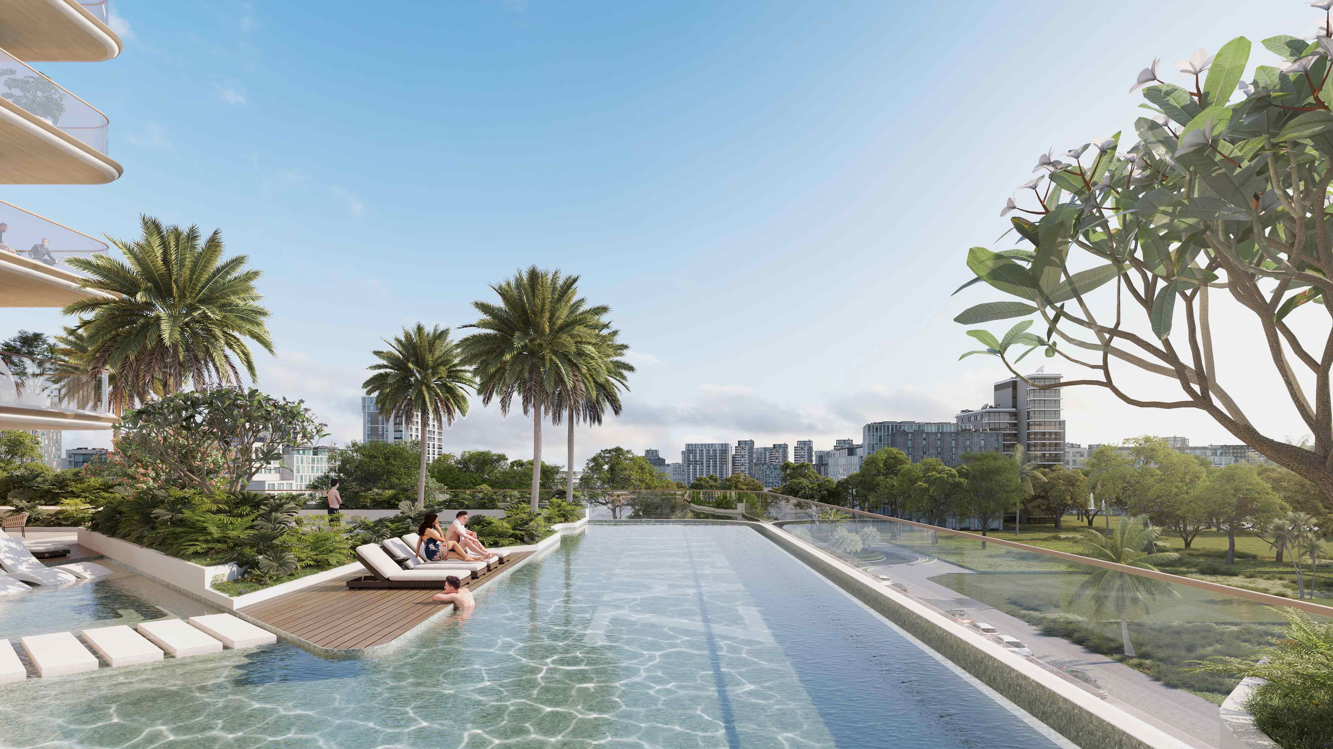 Sunset Bay Grand By Imtiaz A luxurious infinity pool with tropical landscaping, lounging areas, and modern buildings in the background.
